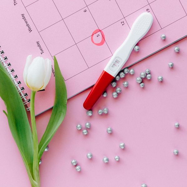 Calendar with marked days showing consistency in building a new habit.