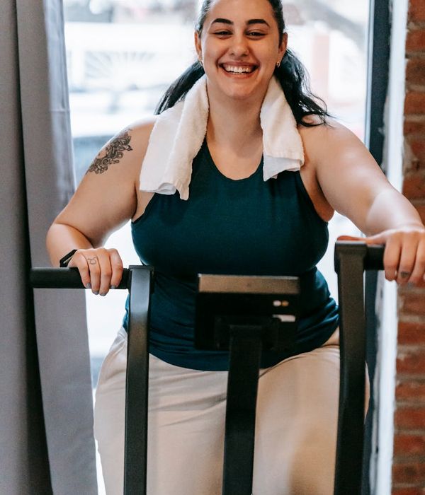 Woman feeling energetic and happy after a moderate cardio session.